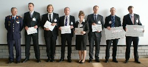 In September, Maj. Gen. Erich Staudacher, GAF (l), chapter president, presents student awards to (2nd to l-r) Jens Vieweg, Martin Weier, Jonathan Kirchhoff, Stefanie Hegele, Marc Arends, Roland Müller and Jan Gassen.
